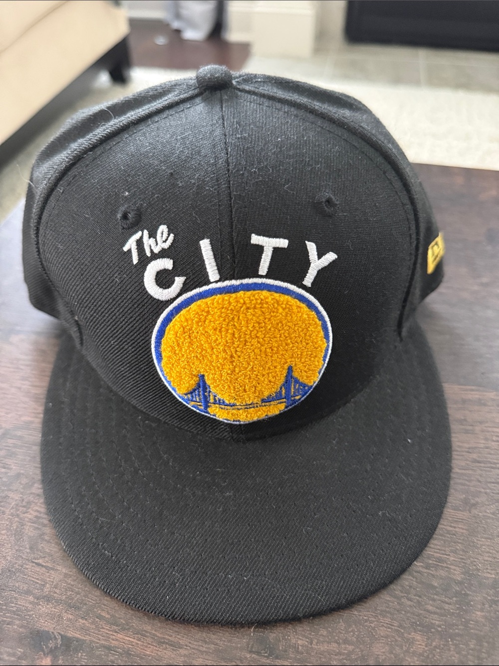 New Era Black Cap with Yellow and Blue Chenille Patch